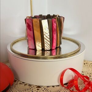 Multicolor Shell Bracelet measuring 2 1/2” , a lot of stretch!